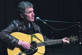 Late songwriter and musician Johnny Duhan performing