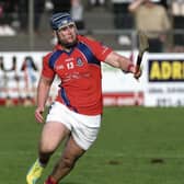 Loughrea's Neil Keary is chased by St Thomas' Bernard Burke during  2025 county senior semi-final at Kenny Park, Athenry
