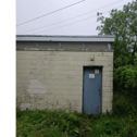 The rundown eir exchange building at Drangan village
