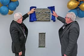 Caption: Bishop Paul Connell with Fr Vinny Connaughton unveiling a plaque to commemorate the 50th Anniversary of Lenamore NS