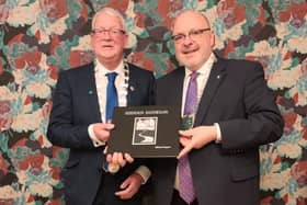 Fianna Fáil Cllr Donal Coyle presenting Hidden Donegal by Michael Sugrue to Rudolstadt Mayor Jörg Reichl