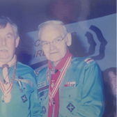 John Casey being presented with the Silver Wolfhound award by chief Scout Peter Dickson at a national scouting conference. It is the highest honour Scouting Ireland can award
