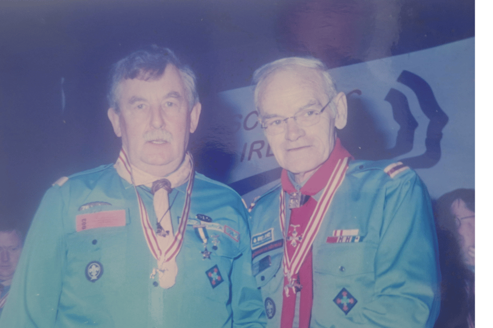 John Casey being presented with the Silver Wolfhound award by chief Scout Peter Dickson at a national scouting conference. It is the highest honour Scouting Ireland can award
