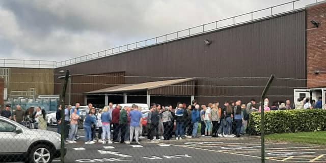 Cardinal Health employees outside the plant last August as details emerged that it planned to cease operations in Tullamore