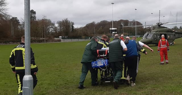 The woman is taken to a helicopter to be airlifted to Dublin for treatment