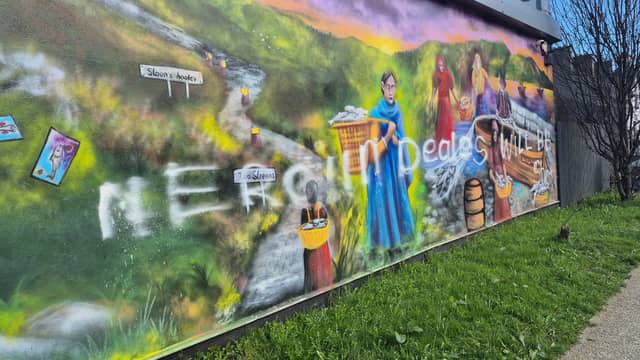 The murals in Omeath after they were graffitied