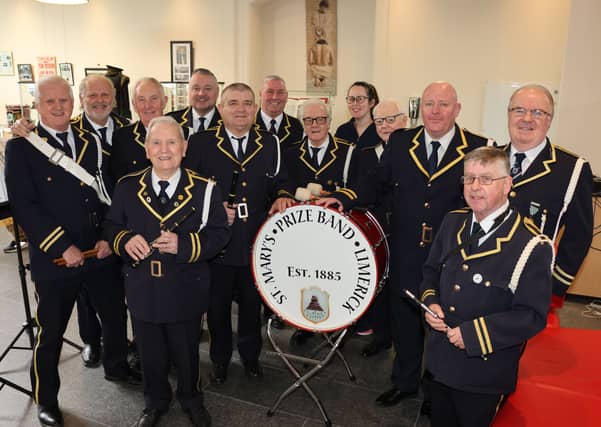 Members of the St Mary's Fife and Drum Band, photographed this Monday, as an exhibition of their memorabilia kicked off in Mary Immaculate College | PICTURE: Adrian Butler
