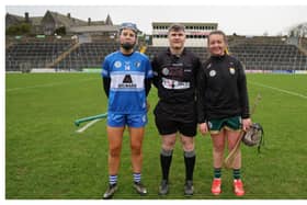 Captains Aimee Collier and Aoife Fitzgerald with referee Aaron Hogg. Picture: Pascal Walsh