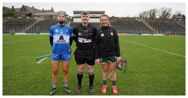 Captains Aimee Collier and Aoife Fitzgerald with referee Aaron Hogg. Picture: Pascal Walsh