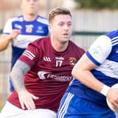 Colum Fagan of Rathcoffey in action against Jason Dunne of Ballykelly