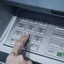 Two teenage girls arrested after coercing people into withdrawing money from ATMs