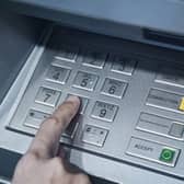 Two teenage girls arrested after coercing people into withdrawing money from ATMs