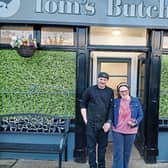 Butcher Tom McNeill with Kate Hanley, a member of Down Syndrome Limerick and one of many visitors to the new shop in Kilteely since it opened last month