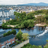 An aerial shot of Lady Blessington's Baths with Clonmel town centre behind and Slievenamon in the distance.