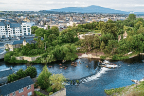 An aerial shot of Lady Blessington's Baths with Clonmel town centre behind and Slievenamon in the distance.