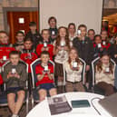 Young Tír Chonaill athletes with their medals. Photo by Philip Mulligan