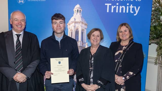 Eoghan Strain with Prof Vincent Wade, Vice-Provost Prof Orla Sheils and Scoil Mhuire Principal Evelyn McLoughlin