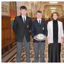 Photo caption (L–R): Ethan Kendrick (Vice-Captain), Jack Landy (Captain) – Junior Cup; Principal Audrey O’Byrne; Mateo Gutierrez (Captain), Aidan Russell (Vice-Captain) – Senior Cup