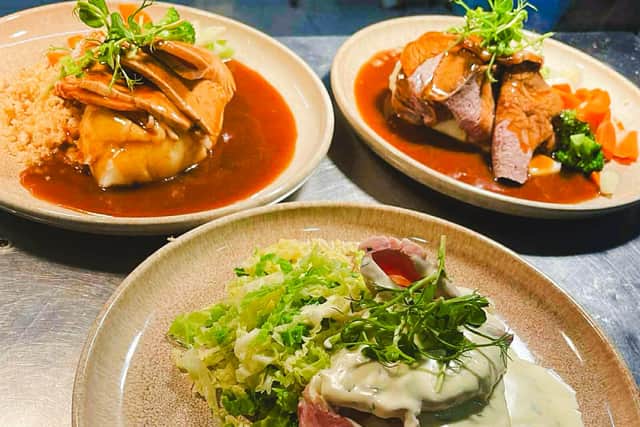 Traditional roast dinners from Savage Restaurant include roast beef, turkey and ham, and traditional bacon and cabbage. Mains also include vol au vents and beer battered cod.