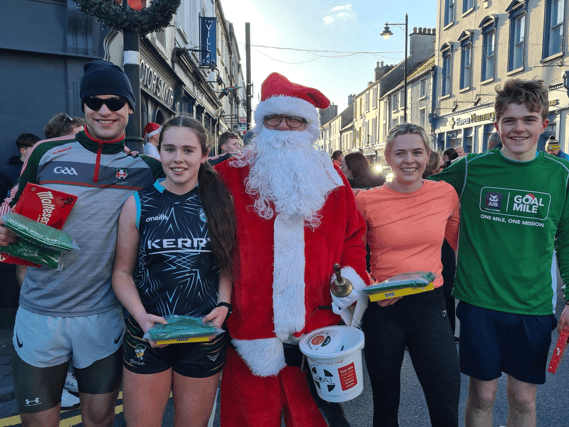 Pictured with Santa are the first male, female, girl and boy over the line at the Birr GOAL Mile - Ronan Murphy, Ali Smyth, Clodagh McIntyre and Tom Enright.