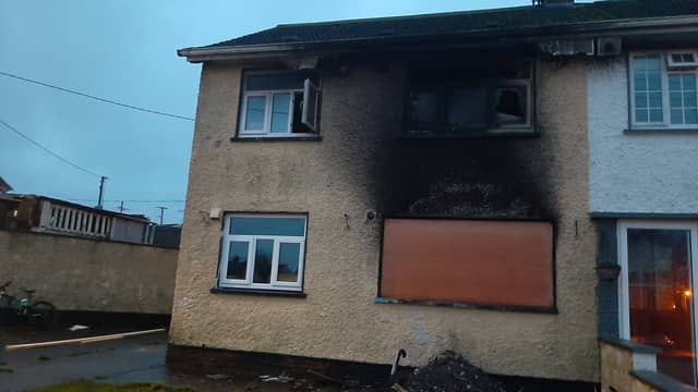 The burned out remains of the house in Edenderry where a woman and a young child died on Saturday night