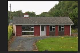 The proposal seeks permission to remove the current dwelling, decommission its septic tank, and develop two detached industrial units on the 0.22-hectare site off the R403