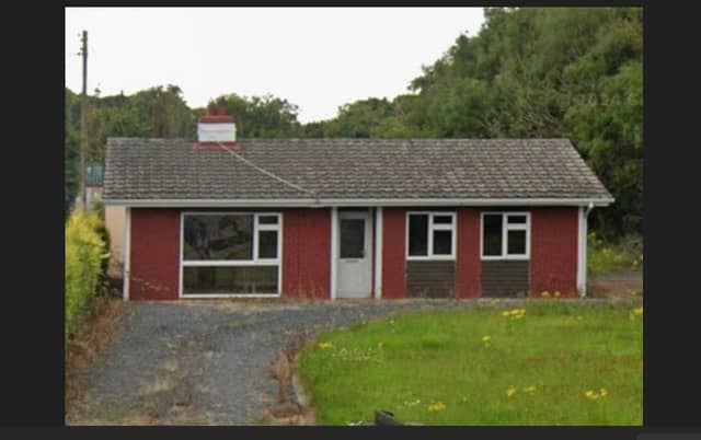 The proposal seeks permission to remove the current dwelling, decommission its septic tank, and develop two detached industrial units on the 0.22-hectare site off the R403