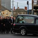 The family of Dylan Commins, 23, from Ardee in Co Louth, who died along with his four friends in a road collision last weekend, follow his coffin. Pics: Liam McBurney/PA Wire
