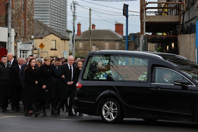 The family of Dylan Commins, 23, from Ardee in Co Louth, who died along with his four friends in a road collision last weekend, follow his coffin. Pics: Liam McBurney/PA Wire