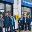 Bank of Ireland’s Culmore Road branch team launch the new defibrillator which has been installed at the front of the branch for community use.