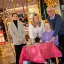 Louise Moorhead,Arts Development Officer, Gasyard Centre pictured with Tori and her mum and grandad on Wednesday at Lisnagelvin Shopping Centre. (Photo: Jim McCafferty Photography)