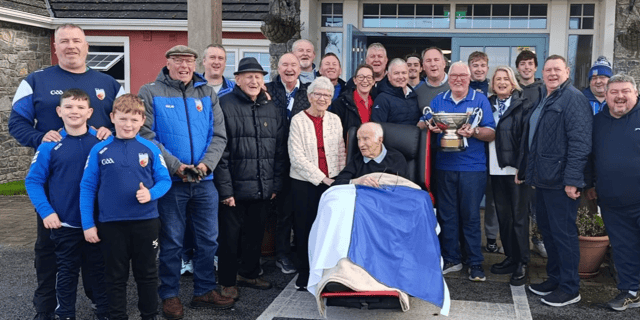 Phil and Celine O'Reilly with the Tullamore fans. Alo Scully is holding the Dowling Cup
