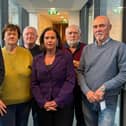 Former Waterford Crystal workers with Sinn Féin leader Mary Lou McDonald and Waterford TD David Cullinane at Leinster House.