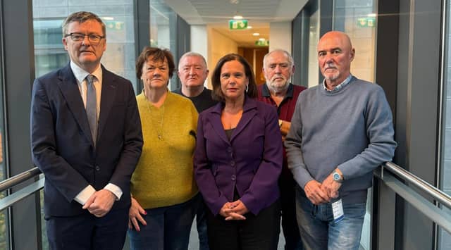 Former Waterford Crystal workers with Sinn Féin leader Mary Lou McDonald and Waterford TD David Cullinane at Leinster House.