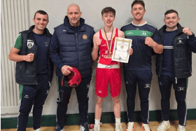 Tommy Fitzpatrick Junior 2 50kgs Champion pictured with Coaches Noel Kehoe, Garry Kehoe, Shay Fitzpatrick and Niall Treacy.