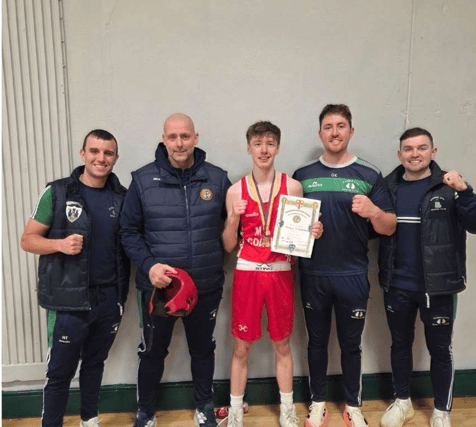 Tommy Fitzpatrick Junior 2 50kgs Champion pictured with Coaches Noel Kehoe, Garry Kehoe, Shay Fitzpatrick and Niall Treacy.