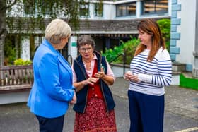 Heather Humphreys talking with locals