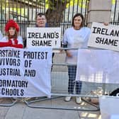 Mary Donovan, Miriam Moriarty Owens, Maurice Patton O'Connell and Mary Dunlevy Greene outside Dáil Éireann