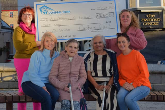 Tracey Faulkner and Angela Mulreany of Curtain Call presented proceeds to the charities in Donegal Town on Tuesday, September 23. Mayor of Donegal Town Anna Gallagher received a cheque on behalf of Donegal Hospice. Phil Gallagher was presented with a cheque for Donegal Cancer Support Centre, and the third cheque was presented to staff and patients from Aras MacSuibhne for the facility’s patient comfort fund.