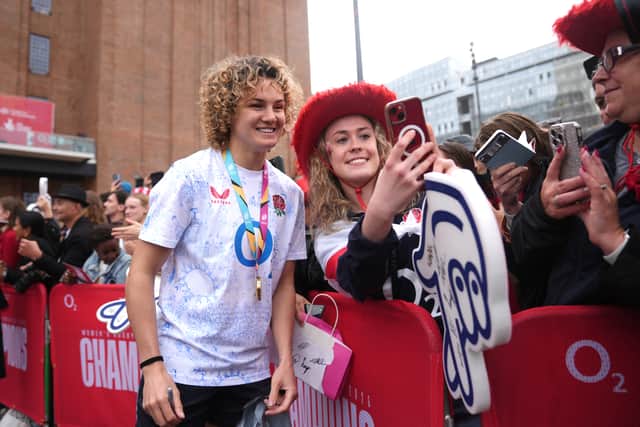 Fans cheered and danced to the anthem of Gala Rizzatto’s Freed From Desire wearing England tops, red cowboy hats and waving foam fingers to celebrate the Red Roses’ win on Saturday over Canada, watched by a record 81,885 people who filled a sold-out Allianz Stadium in Twickenham.