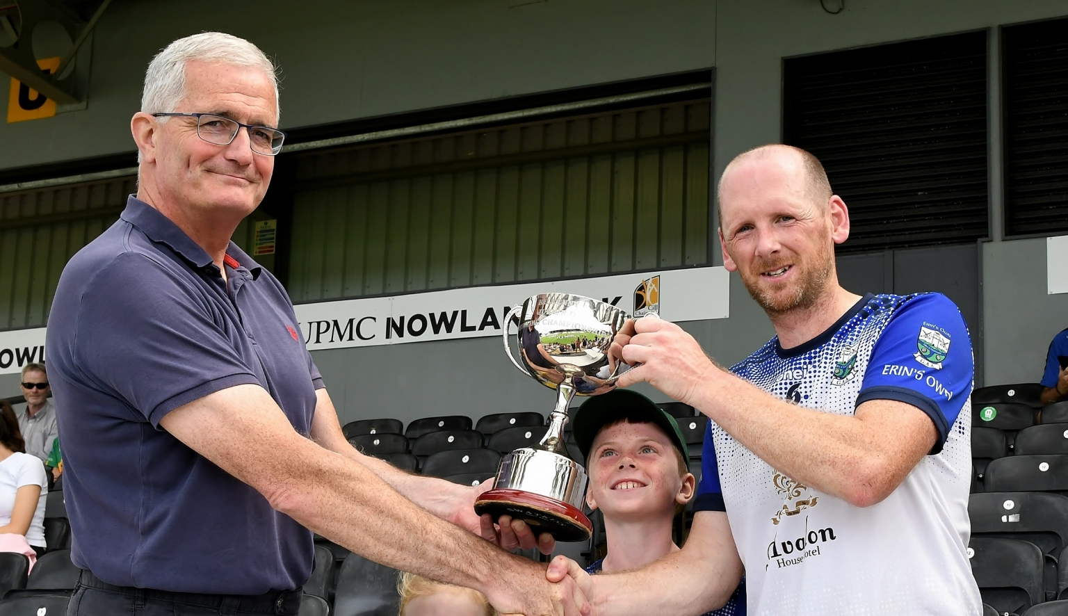 Erin’s Own captain Damien Fogarty receives the trophy. Picture: Willie Dempsey