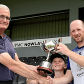 Erin’s Own captain Damien Fogarty receives the trophy. Picture: Willie Dempsey