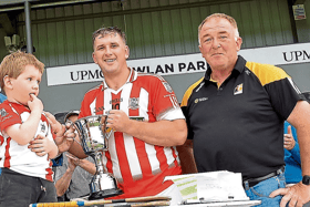Sean Kehoe (Young Irelands) receives the Junior E trophy. Picture: Willie Dempsey