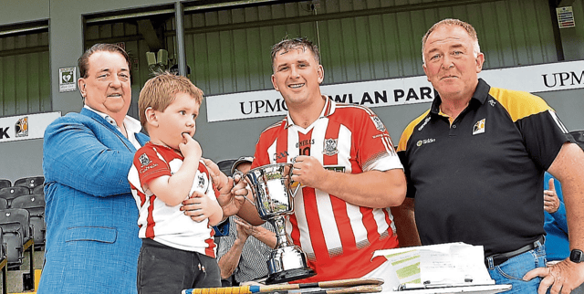 Sean Kehoe (Young Irelands) receives the Junior E trophy. Picture: Willie Dempsey