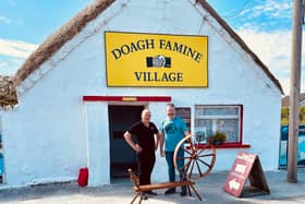 David Brennan presenting his spinning wheel to Pat Doherty, Doagh Famine Village