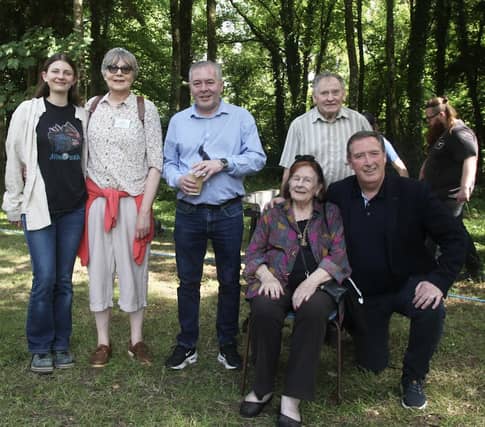 Mary (O'Carroll)Swan pictured seated with Tony McCormack TD and Councillor Frank Moran behind