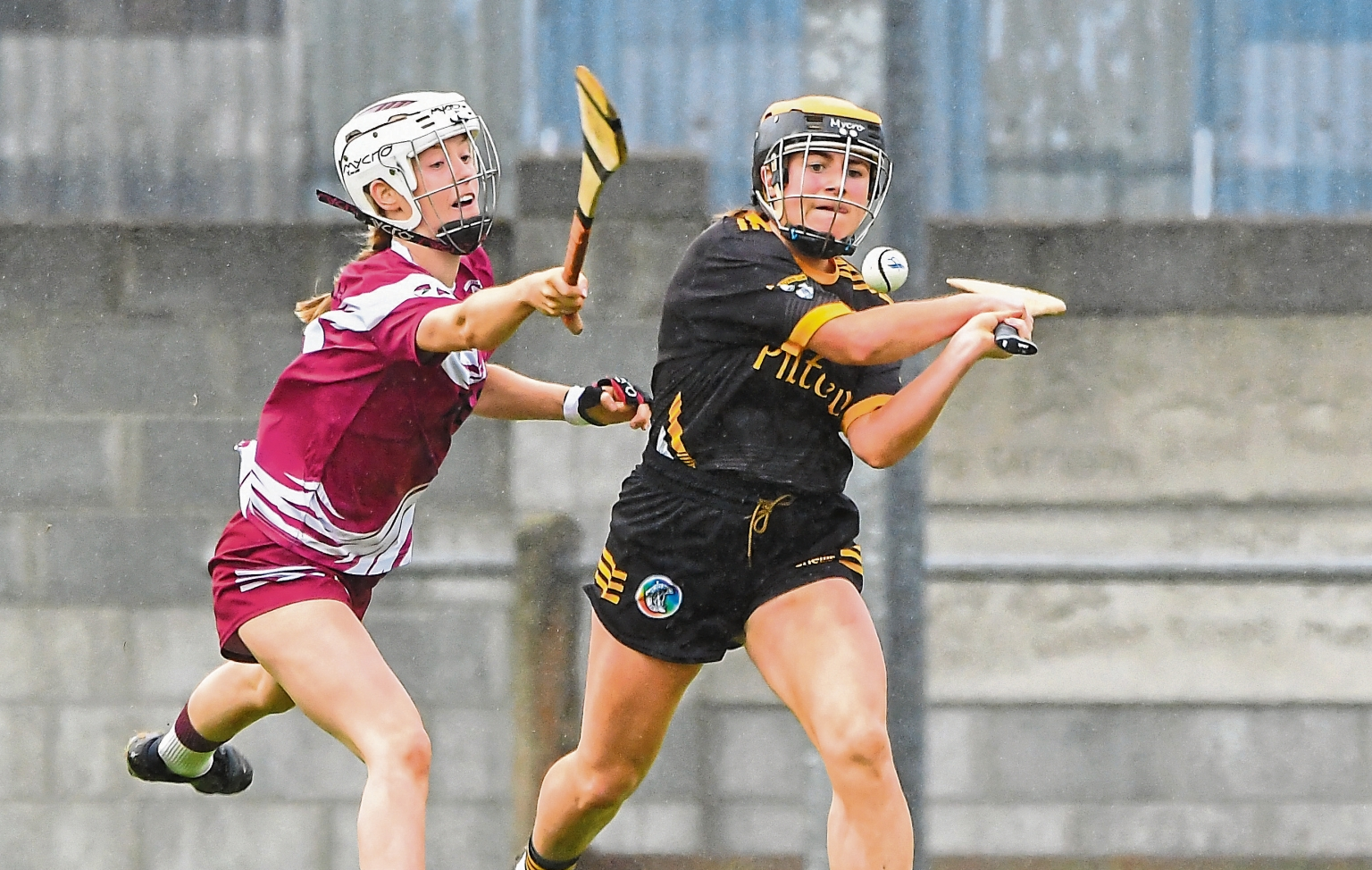 Katie Ryan (Clara) moves in to try and hook Lorraine Long (Piltown) during Sunday’s game. Picture: Billy Culleton