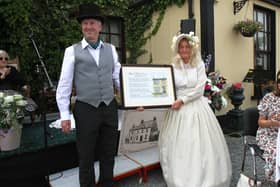 Nigel West presenting a poem written about the Bronte birthplace in Thornton to Nicola Daly (secretary of the Banagher Bronte Group) during the garden party and Bronte book launch.