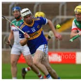 Shane Madden, Rathdowney Errill playing this sliotar clear on Saturday. Photo Denis Byrne