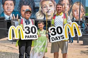Emma Dunne, McDonald’s Foyleside, with Morgan and Emmet Fletcher, Trojans FC, at the McDonald’s ‘30 Parks Litter Clean-Up’ around Lover’s Retreat in Derry.